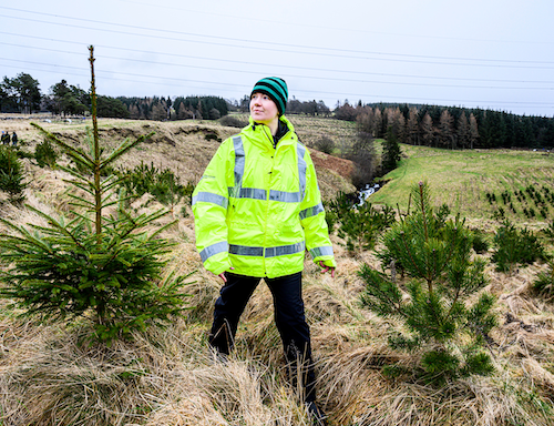 person walking with high vis jacket