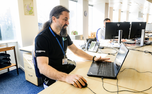 man on computer