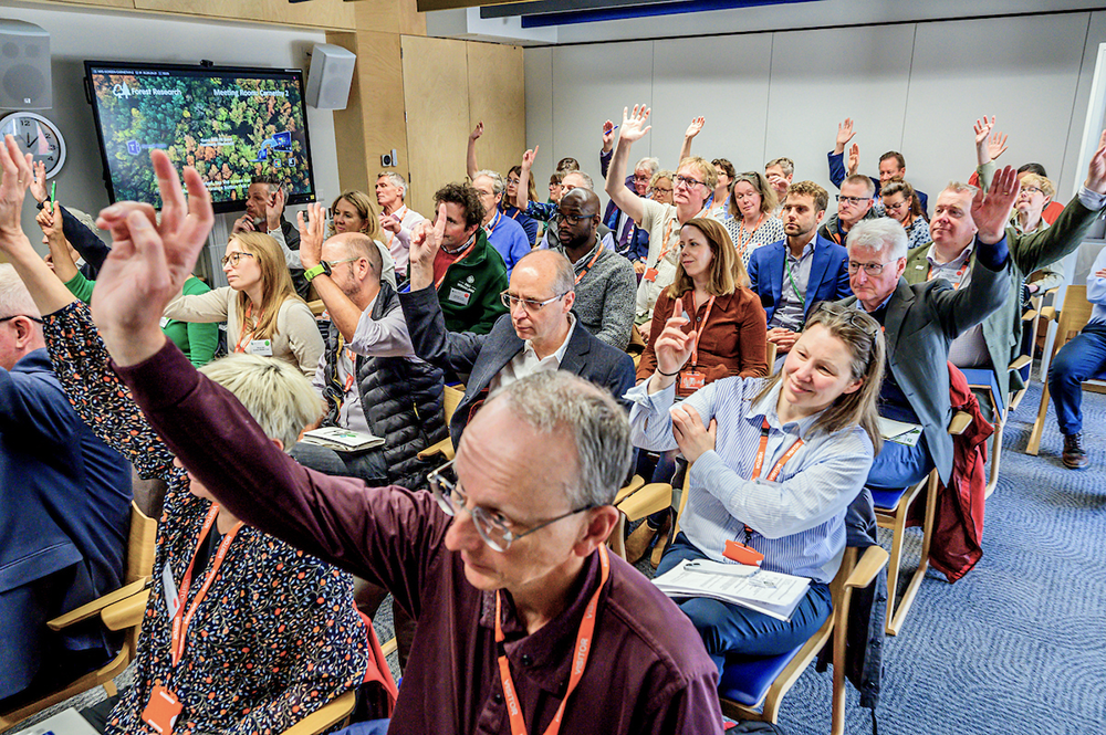 Delegates raise their hands, and provide input to Scottish Forestry Strategy event.